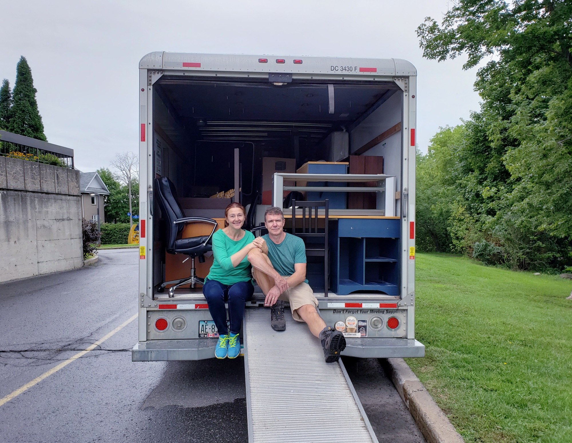 Couple is ready to move in new place, move, truck filled with furniture, changing appartement